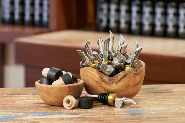 wood bowl full of pour spouts - Anytime Bar Supplies Pour Spouts