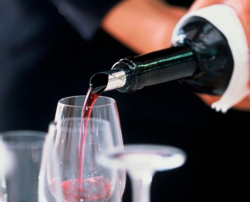 person pouring red wine - Anytime Bar Supplies Pour Spouts