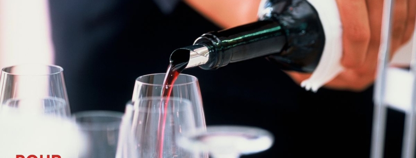 person pouring red wine - Anytime Bar Supplies Pour Spouts