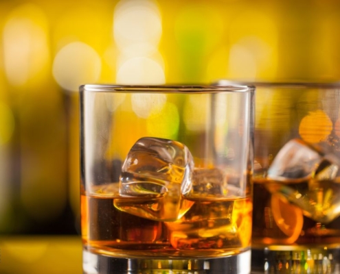 two glasses containing ice and brown liquor - Anytime Bar Supplies Pour Spouts