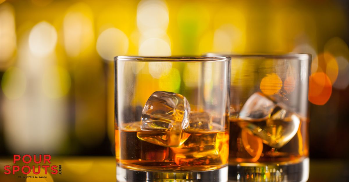 two glasses containing ice and brown liquor - Anytime Bar Supplies Pour Spouts