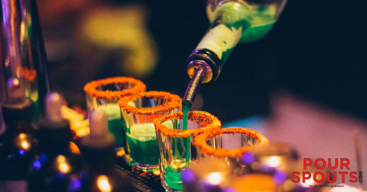 person pouring liquor into shot glasses - Anytime Bar Supplies Pour Spouts liquor bottle pour spout