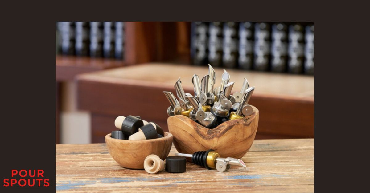 bowl of self closing pour spouts at a bar - Pour Spouts by Anytime Bar Supplies self closing pour spouts