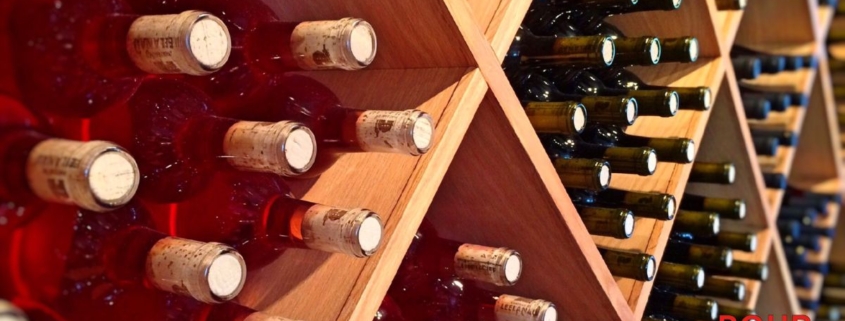 wine bottles in storage - Pour Spouts by Anytime Bar Supplies wine pourer