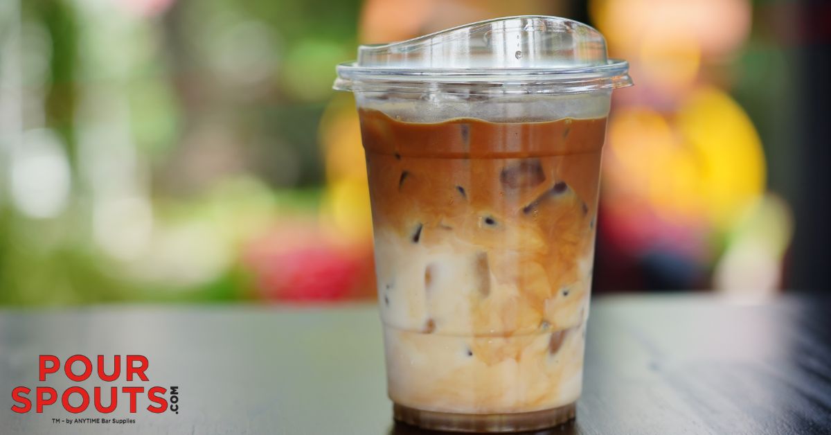 Iced coffee drink in a plastic cup - Pour Spouts for coffee syrups