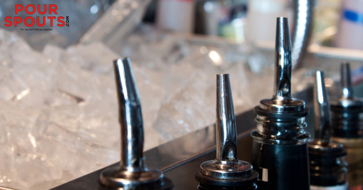 silver pour spouts next to bucket of ice - Pour Spouts