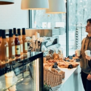 man and woman placing order at a coffee shop - Pour Spouts