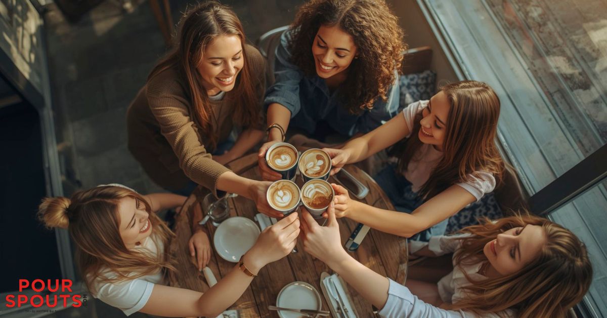 women celebrating with alcoholic drinks - Pour Spouts cocktail bar